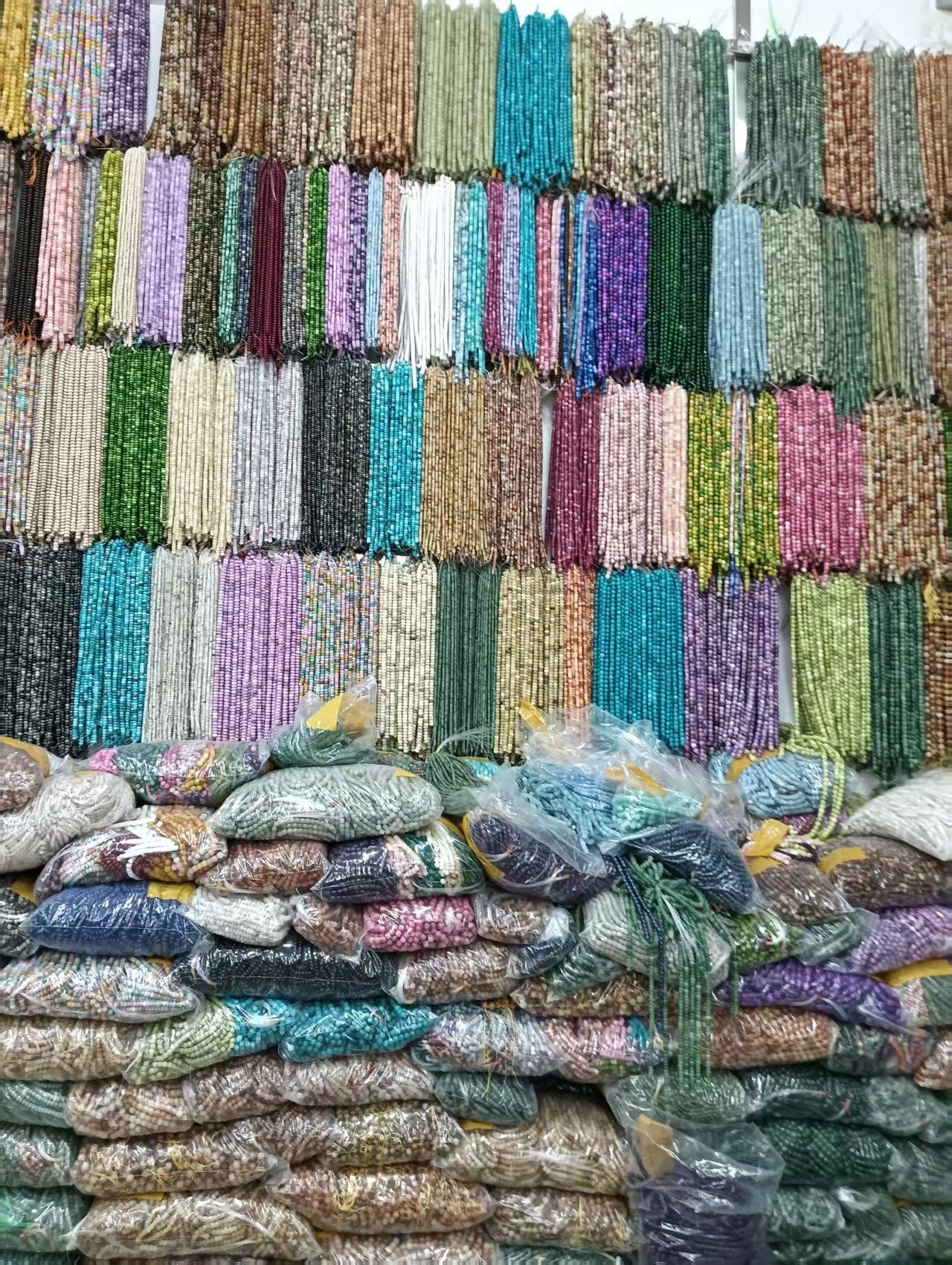 Bead and stone strands at a Yiwu raw-material sourcing point